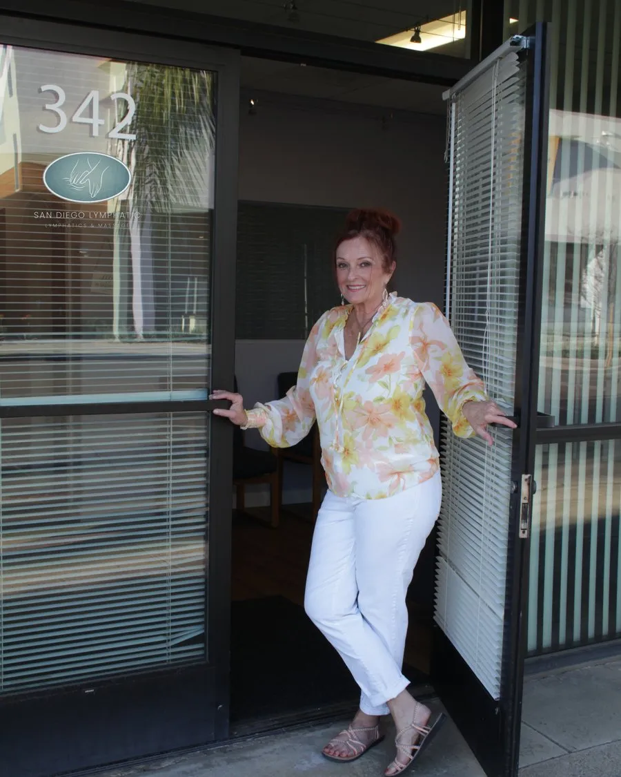 Suzanne Armstrong welcoming clients at the door of her Escondido office, 342 E. Valley Parkway